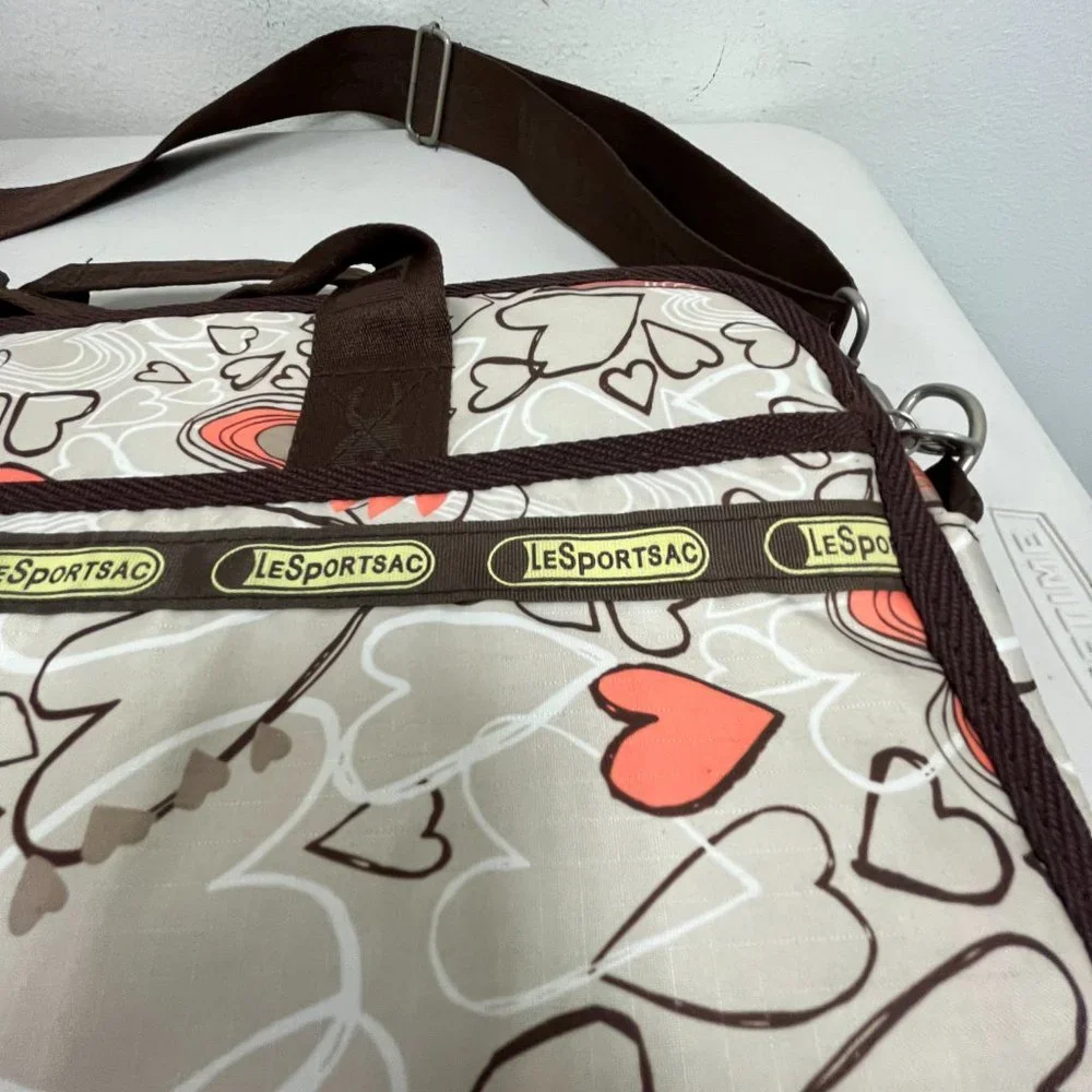Le Sportsac computer messenger bag 11 x 15 hearts pink brown shoulder strap